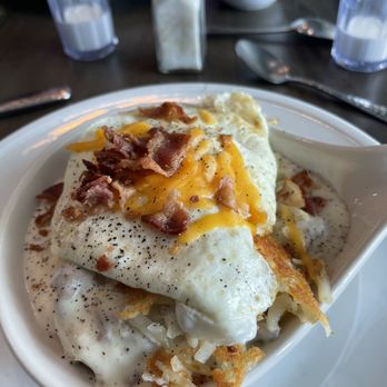 Seascape Restaurant - Breakfast skillet with egg, hashbrowns biscuits, and gravy - Breakfast & Brunch Near Me - New Smyrna Beach, Florida