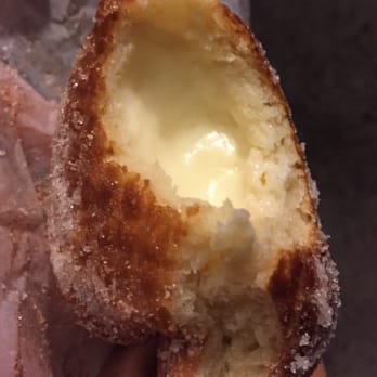 Leonard's Bakery - Inside of custard malasada puff - Bakeries Near Me - Honolulu, Hawaii