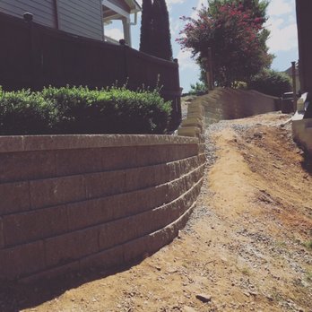 Milestone Masonry Pro - A large retaining wall project we did for a friend in Canton, GA. This wall flows perfectly with their yard from the back to front. - Masonry/Concrete Near Me Milestone Masonry Pro - A large retaining wall project we did for a friend in Canton, GA. This wall flows perfectly with their yard from the back to front. - Masonry/Concrete Near Me