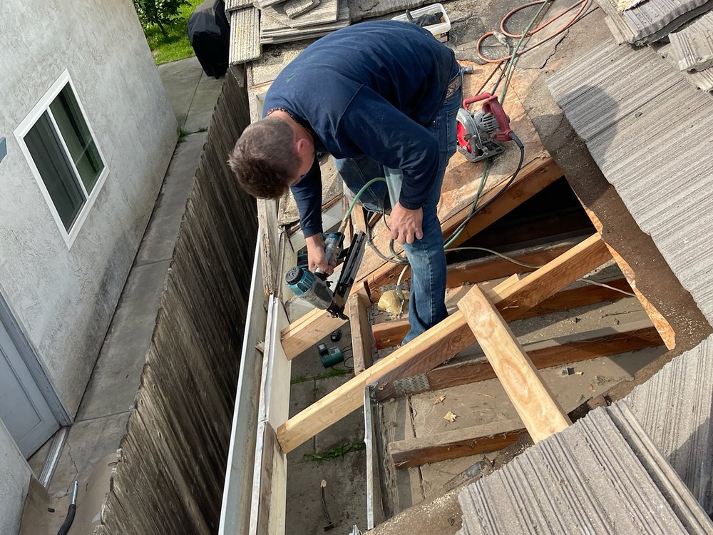 Slide of Albas Roofing