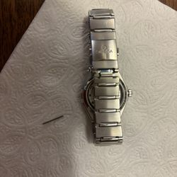 Northeastern Fine Jewelry - Omega Constellation watch with pin that fell off, and was never secured properly.