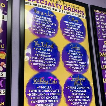 Roasty Toasty - Specialty Drink Menu - A brightly colored menu board displays specialty drink options at a coffee shop, including ice cream flavors and toppings, with sections for Berry in Love, S'Mores, The Forest, Snickers, Birthday Cake, and Grasshopper Mocha. - Coffee & Tea Near Me - DeForest, Wisconsin