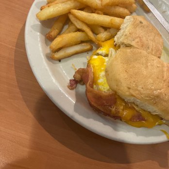 Clarkies Diner - Bacon breakfast sandwich with eggs over medium and French fries. - Sandwiches Near Me - Yucaipa, California Clarkies Diner - Bacon breakfast sandwich with eggs over medium and French fries. - Sandwiches Near Me - Yucaipa, California