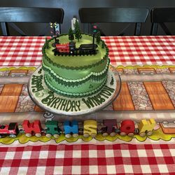 Wedding Wonderland Cake Shop - Train cake, dark chocolate cake with peanut butter fill.