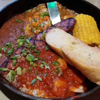Razzoo's Cajun Cafe - skillet meal wt andouille, red beans & rice, dirty rice wt crawfish etoufee & shrimp Creole, corn on the Cobb. A whole Lotta yum! - Cajun/Creole Near Me - Spring, Texas Razzoo's Cajun Cafe - skillet meal wt andouille, red beans & rice, dirty rice wt crawfish etoufee & shrimp Creole, corn on the Cobb. A whole Lotta yum! - Cajun/Creole Near Me - Spring, Texas