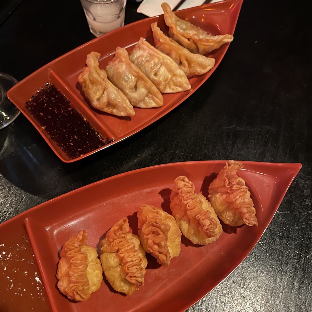 Nano Ramen & Sushi - a plate of dumplings and a plate of dumplings - Sushi Bars Near Me - Chicago, Illinois Nano Ramen & Sushi - a plate of dumplings and a plate of dumplings - Sushi Bars Near Me - Chicago, Illinois