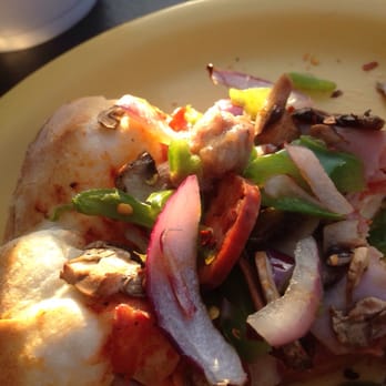 David's Pizza - Half combo, Half meat lovers pie. Here's a combo slice I was about to inhale. Eatin in the patio enjoying this great weather. - Pizza Near Me - Stockton, California