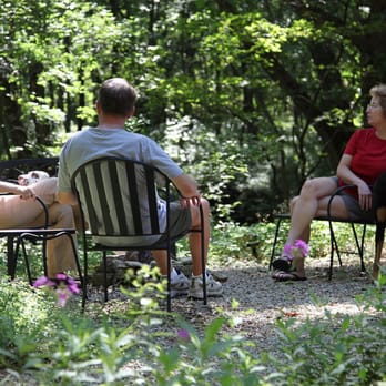 Master Landscape Inc - three people sitting in chairs in the woods - Nurseries & Gardening Near Me - Manhattan, Kansas