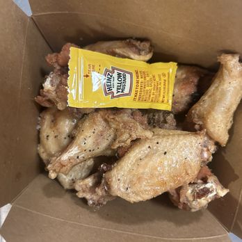 Wing Dome - Tiny wings. Tiny mustard packet for reference - Chicken Wings Near Me - Seattle, Washington