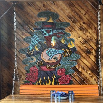 Whiskey Diablo - Artwork by swing table - Mexican Near Me - McHenry, Illinois Whiskey Diablo - Artwork by swing table - Mexican Near Me - McHenry, Illinois