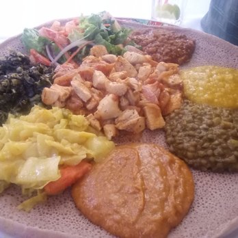 Blue Nile - Vegetarian combo w/ chicken tibbs. - Ethiopian Near Me - Houston, Texas