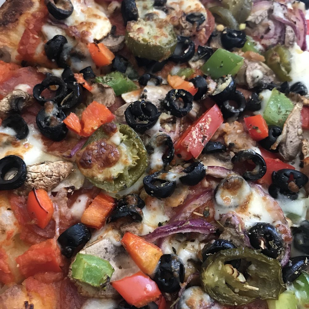 5000 Pies - Ordered no cheese on half and it came out all cheese - And on top of that, the guy complained while making it and made it his way. So bad. - Pizza Near Me - Long Beach, California