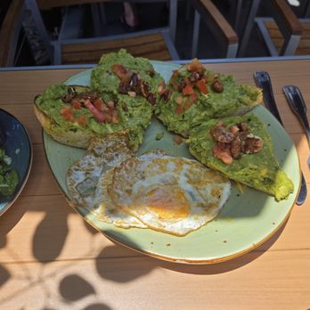 Local Kitchen - Avocado toast and egg. More like Avocado loaf of bread. Huge. - American Near Me - Manhattan Beach, California