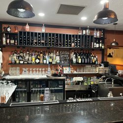 Cafe Roma Ristorante - The bar is private open and welcoming with a great happy hour!