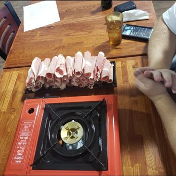 Dumpling House - Hot plate. If you've got wiggly curious little ones, I'd suggest you not bring them. - Chinese Near Me - Muncie, Indiana