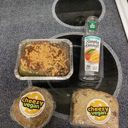 Simply Orange bottle orange juice, 2 stuffed peppers (vegan meat, rice, cheese in a green pepper, muffin, cranberry? bread.
