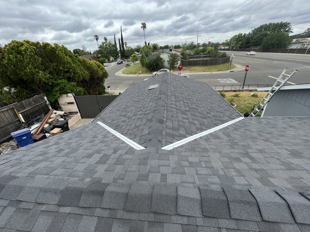 Slide of New Era Roofing