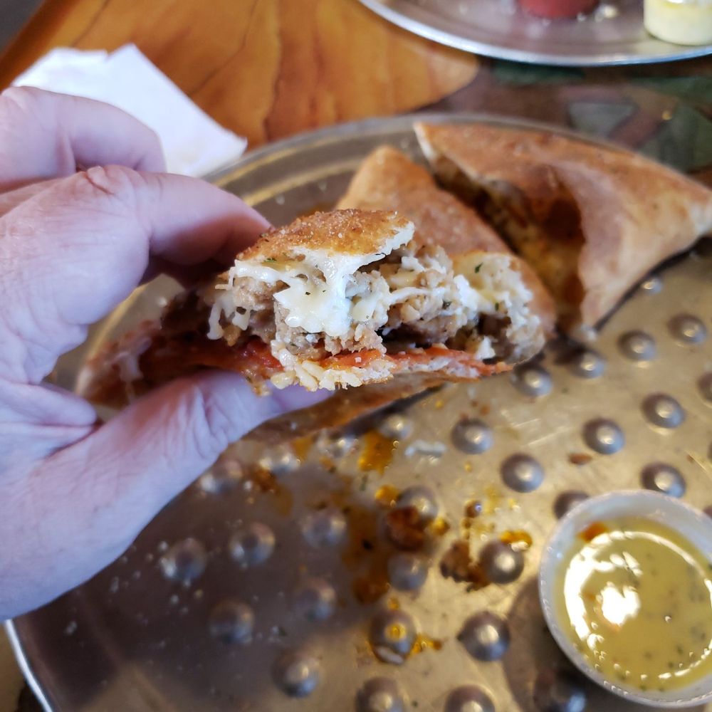 Palio's Pizza Cafe - Calzone. The way God intended. Delicious! - Italian Near Me - Fort Worth, Texas Palio's Pizza Cafe - Calzone. The way God intended. Delicious! - Italian Near Me - Fort Worth, Texas