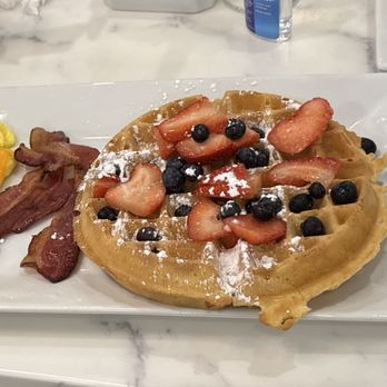 Breakfast at Ruiz - Belgian waffles (extra fruit on the side), eggs with cheese, and bacon. - Breakfast & Brunch Near Me - Elgin, South Carolina Breakfast at Ruiz - Belgian waffles (extra fruit on the side), eggs with cheese, and bacon. - Breakfast & Brunch Near Me - Elgin, South Carolina