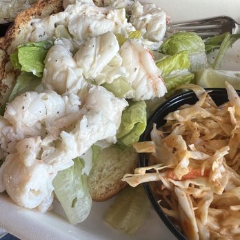Belly’s On The Brazos - Lobster roll and both dill and the spicy Cole slaw. - New American Near Me - Freeport, Texas Belly’s On The Brazos - Lobster roll and both dill and the spicy Cole slaw. - New American Near Me - Freeport, Texas