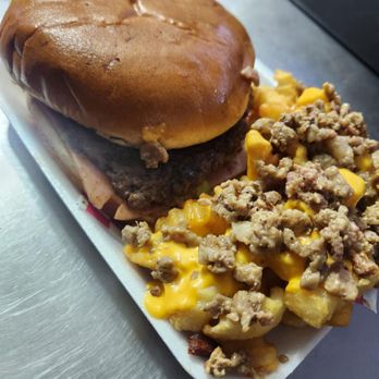 Taqueria el Arado - Mexican style burger with ham super delicious and the cheese fries with bistec super good - Tacos Near Me - Brownsville, Texas Taqueria el Arado - Mexican style burger with ham super delicious and the cheese fries with bistec super good - Tacos Near Me - Brownsville, Texas