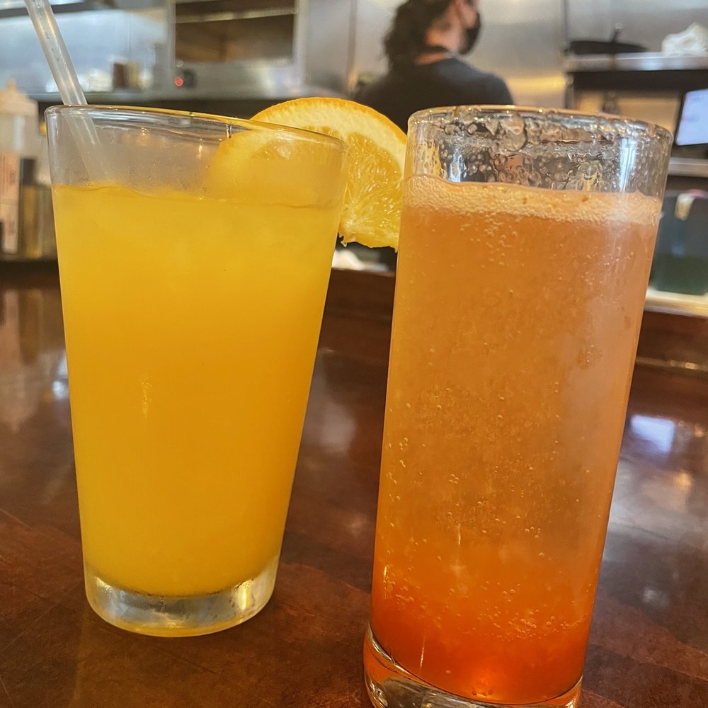 Backwater - Screwdriver & strawberry/lemonade mimosa - Breakfast & Brunch Near Me - Melbourne, Florida Backwater - Screwdriver & strawberry/lemonade mimosa - Breakfast & Brunch Near Me - Melbourne, Florida