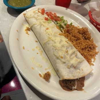 Chuy's - Big "As your head" burrito. It really slapped but there was a tad bit too much beans for our taste. Still finished 90% of it. - Tex-Mex Near Me - Lutz, Florida