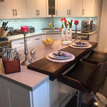 Ores Construction - a kitchen with a center island - General Contractors Near Me - Newport Beach, California Ores Construction - a kitchen with a center island - General Contractors Near Me - Newport Beach, California