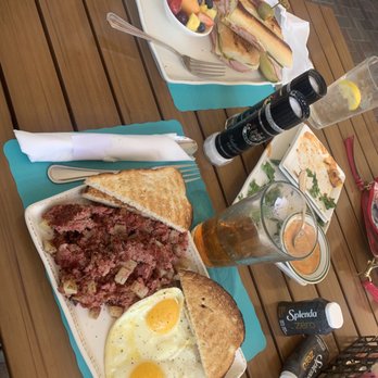 Blu Island Bistro - Corn beef hash, eggs, sourdough toast...and Cuban sandwich with fresh fruit on the side. - New American Near Me - Venice, Florida Blu Island Bistro - Corn beef hash, eggs, sourdough toast...and Cuban sandwich with fresh fruit on the side. - New American Near Me - Venice, Florida