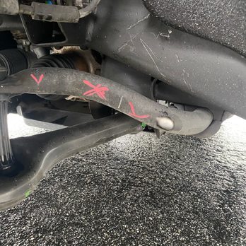 Euro American Collision Center - Lower control arm showing rub marks from the tire. Driver side. AFTER BODY REPAIR WORK DONE correctly, CADILLAC SERVICE returned this to me. - Body Shops Near Me - Costa Mesa, California