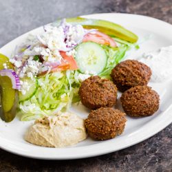Shawarma Times & Grill - Freshly made falafels with our homemade hummus and tzatziki. With locally grown ingredients for our salad! Doesn't get any fresher than this