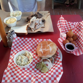 Dixie Grill - Such a yummy meal! Pulled pork, 3 meat dish and hush puppies! - Southern Near Me - Aiea, Hawaii Dixie Grill - Such a yummy meal! Pulled pork, 3 meat dish and hush puppies! - Southern Near Me - Aiea, Hawaii