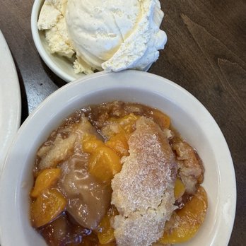 His Place Eatery - North - Peach cobbler with vanilla ice cream. So good! And the ice cream was amazing as well! - Soul Food Near Me - Indianapolis, Indiana