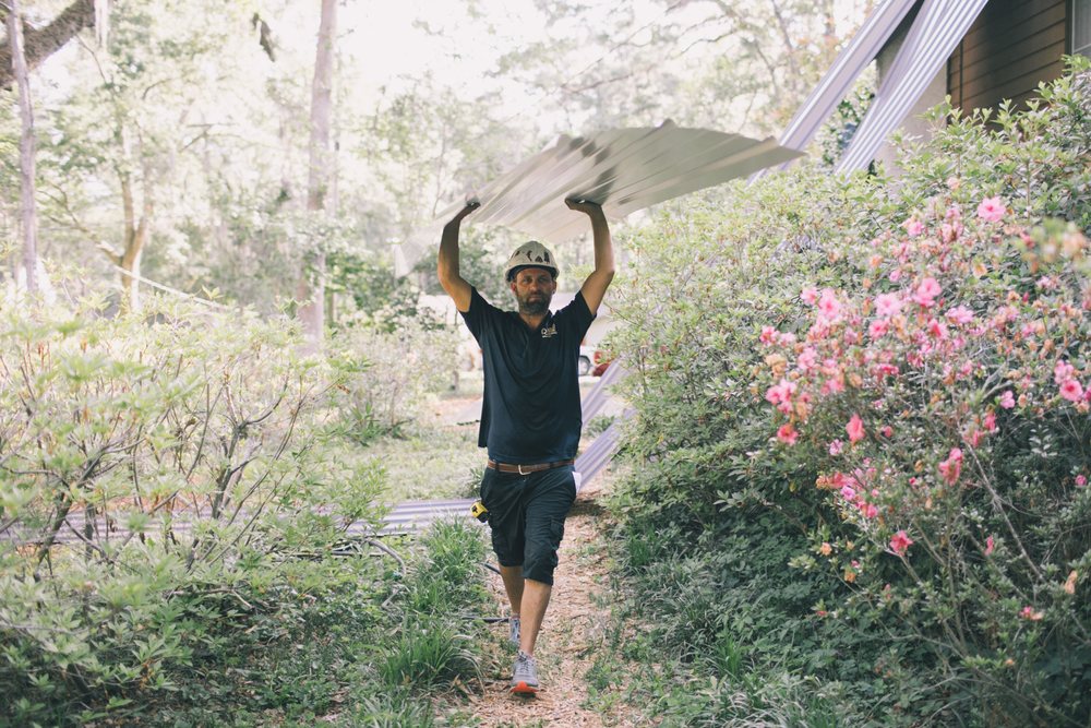 Slide of Tadlock Roofing