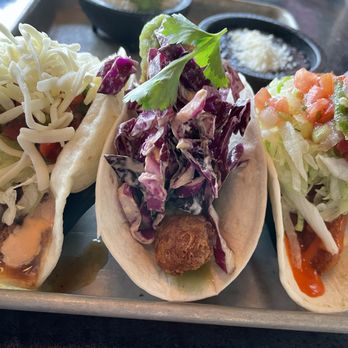 Hombre y Lobo | Tacos + Tequila - Left to right: CHORIZO, BAJA FISH, BUFFALO CHICKEN - Tacos Near Me - Buffalo, New York