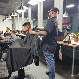 Alex working his magic on my boy.