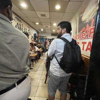 Super Taste - Very tight and narrow inside. Tables against both walls and a line forms down the Ctr - Chinese Near Me - New York, New York Super Taste - Very tight and narrow inside. Tables against both walls and a line forms down the Ctr - Chinese Near Me - New York, New York
