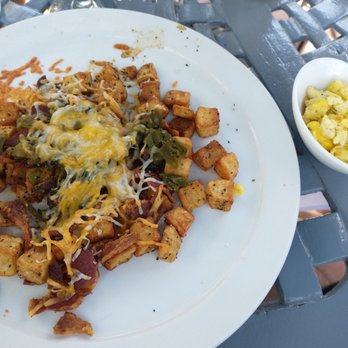 Damacios Bar & Tapas - Loaded potatoes, eggs on the side - Tapas Bars Near Me - Albuquerque, New Mexico