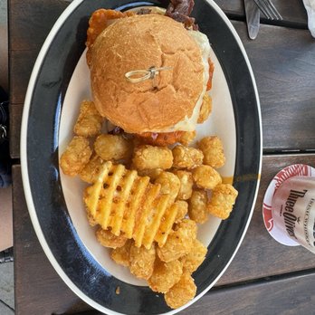 The Corner Pub and Grill - Hot & Spicy Chicken Sandwich with Tater Tots - Sports Bars Near Me - O'fallon, Missouri