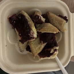 A dried up, broken up semblance of a slice of berry pie, and as you see it, is how I received it.