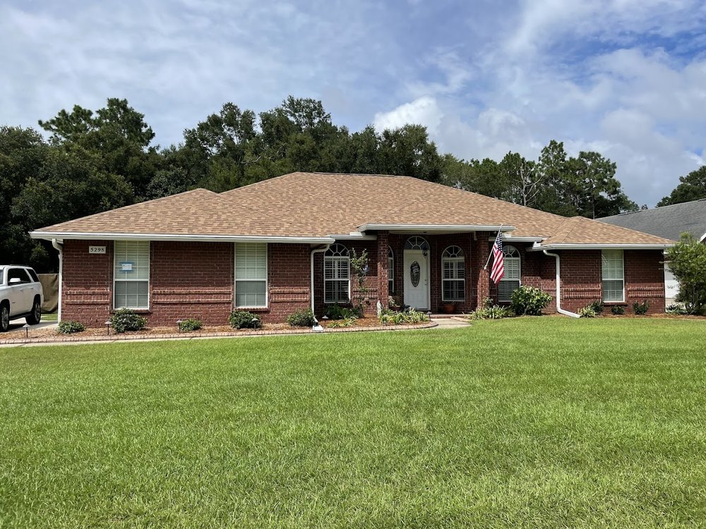 Slide of H.E. Roberts Roofing