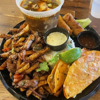 Cris and John - Birria Special (chicken egg rolls, birria tacos, beef tenderloin saltado and rice, angry grilled chicken ramen) - Vietnamese Near Me - Dallas, Texas