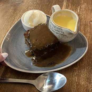 The Crown Liquor Saloon - sticky toffee pudding with custard and ice cream - Pubs Near Me - Belfast, BFS