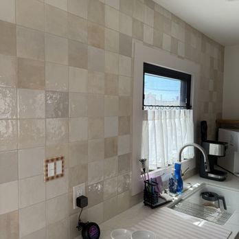 Larios Tile - Counter to ceiling, perfection! - Tiling Near Me