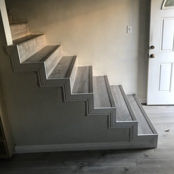 Quintero Flooring - a staircase leading to a front door - Flooring Near Me Quintero Flooring - a staircase leading to a front door - Flooring Near Me