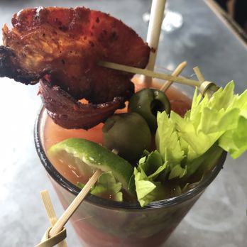 Revival Bar & Kitchen - Bloody Mary w/ warm bacon - New American Near Me - Berkeley, California Revival Bar & Kitchen - Bloody Mary w/ warm bacon - New American Near Me - Berkeley, California