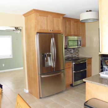 Let Frank Do It - a kitchen with stainless steel appliances - General Contractors Near Me - Potomac, Maryland Let Frank Do It - a kitchen with stainless steel appliances - General Contractors Near Me - Potomac, Maryland