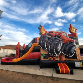 Robinson's Rentals - 27ft combo wet or dry monster truck - Bounce House Rentals Near Me