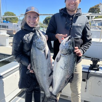 Fish Emeryville - I caught the biggest catch on our boat (beginners luck is a real thing) and they had my fiancé hold the other big catch for the photo. ;) - Fishing Near Me - Emeryville, California