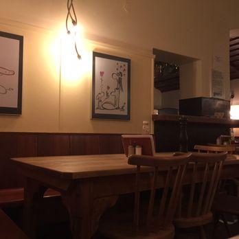 Steinheil 16 - Dining area with long tables where you'll get to know random diners unless you bring a group. - Schnitzel Near Me - Munich, BY